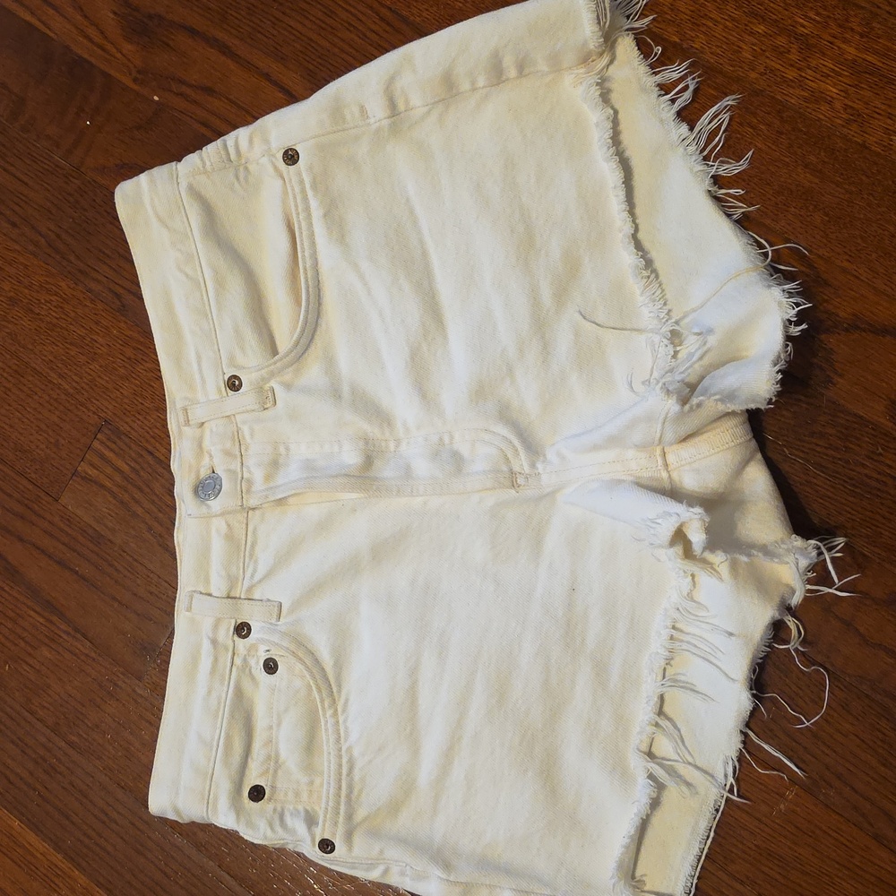 AGOLDE white denim cutoff shorts